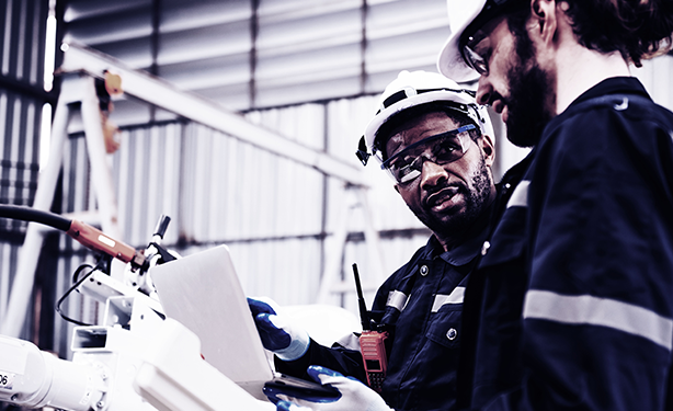 maintenance-excellence-two-men-helmets